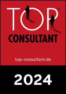 Top Consultant Siegel – a red and black sign with a person on the top